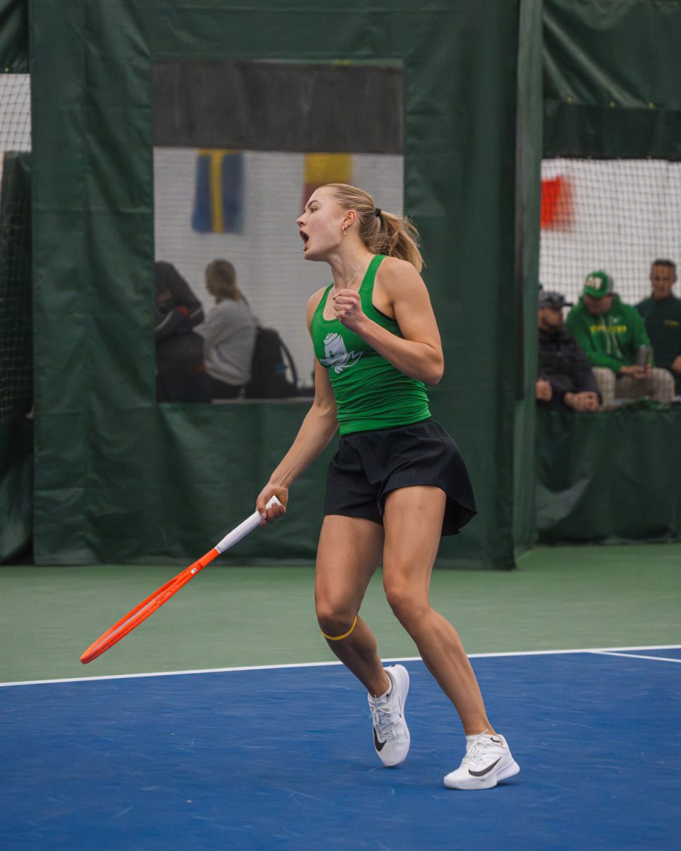 Fist pumping, junior Tilde Jagare celebrates after winning a point. The University of Oregon Women’s tennis team defeated Rutgers University 4-0 on March 8, 2026, in Eugene, Ore., at the Student Tennis Center. (Lilly Wall/Emerald)