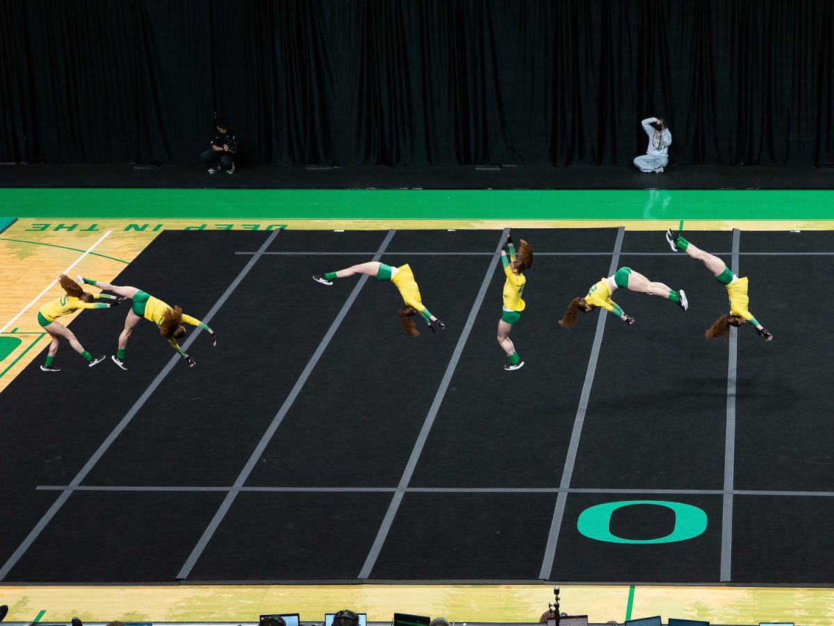 Oregon top tumbler Briya Alvarado makes her solo pass during the tumbling event. The University of Oregon Acrobatics and Tumbling team beat the Iona Gaels 268.105-265.210 at Matthew Knight Arena in Eugene, Ore. on Mar. 15, 2026. (Saj Sundaram/Emerald)