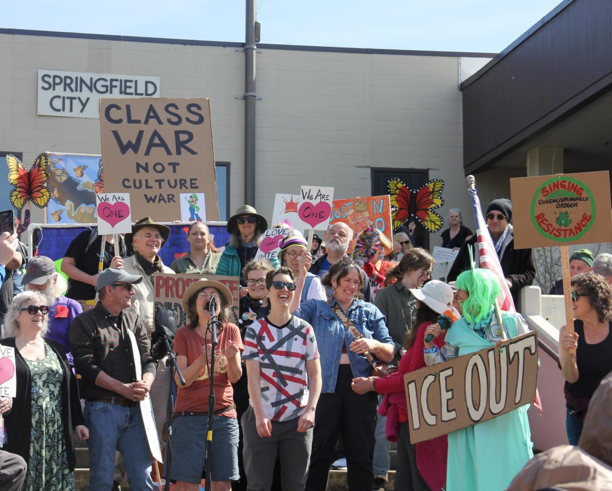Protesters lead a crowd of nearly 3,500 in song outside Springfield City Hall during a third round of “No Kings” protests against the Trump administration in Springfield, Ore., on March 28, 2026. (Tarek Anthony/Emerald)