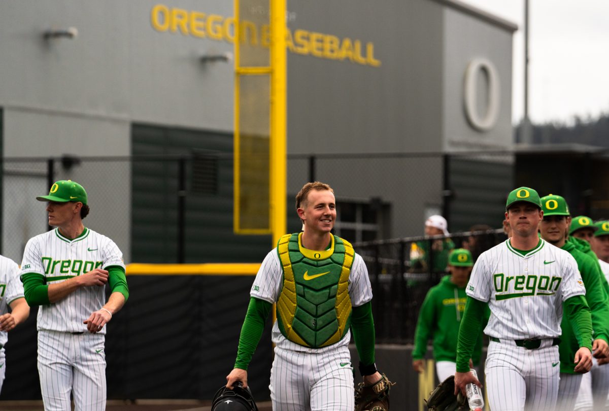 Duck sophomore catcher Burke-lee Mabeus (5) leads the team out to the field before the start of the game. On March 31st, 2026 the Oregon Ducks Baseball team took on the Portland Pilots at PK Park in Eugene, Ore. (Katie Poluyansky/Emerald)