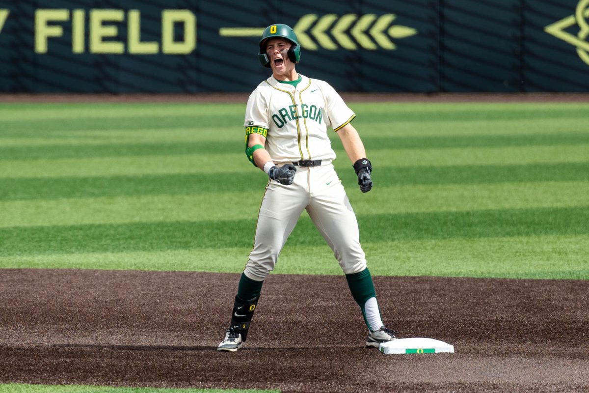 University of Oregon catcher Burke-Lee Mabeus (5) celebrates a double that resulted in a go-ahead run for Oregon against University of Nebraska on April 12, 2026 in Eugene, Ore. Oregon would defeat the Cornhuskers 5-4 in the third game of the series. (Charlie Mack/Emerald)