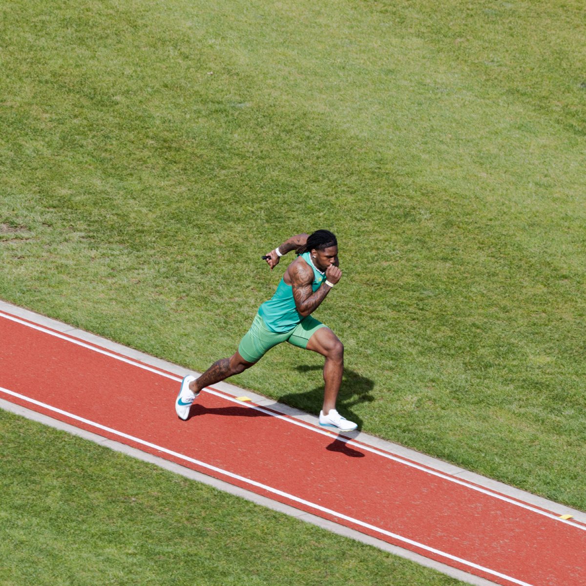 Dakorien Moore runs along the long jump track. The Oregon Ducks host day one of the Oregon Team Invitational at Hayward Field in Eugene, Ore., on April 17, 2026. (Owen Burriss/Emerald)