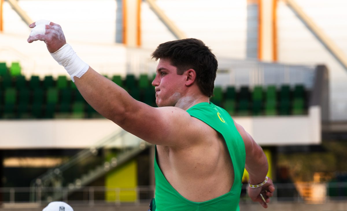 Oregon thrower Ben Smith throws during shotput. On April 18, 2026 the University of Oregon hosted the "Oregon Team Invitational" at Hayward Field in Eugene, Ore. (Katie Poluyansky/Emerald)