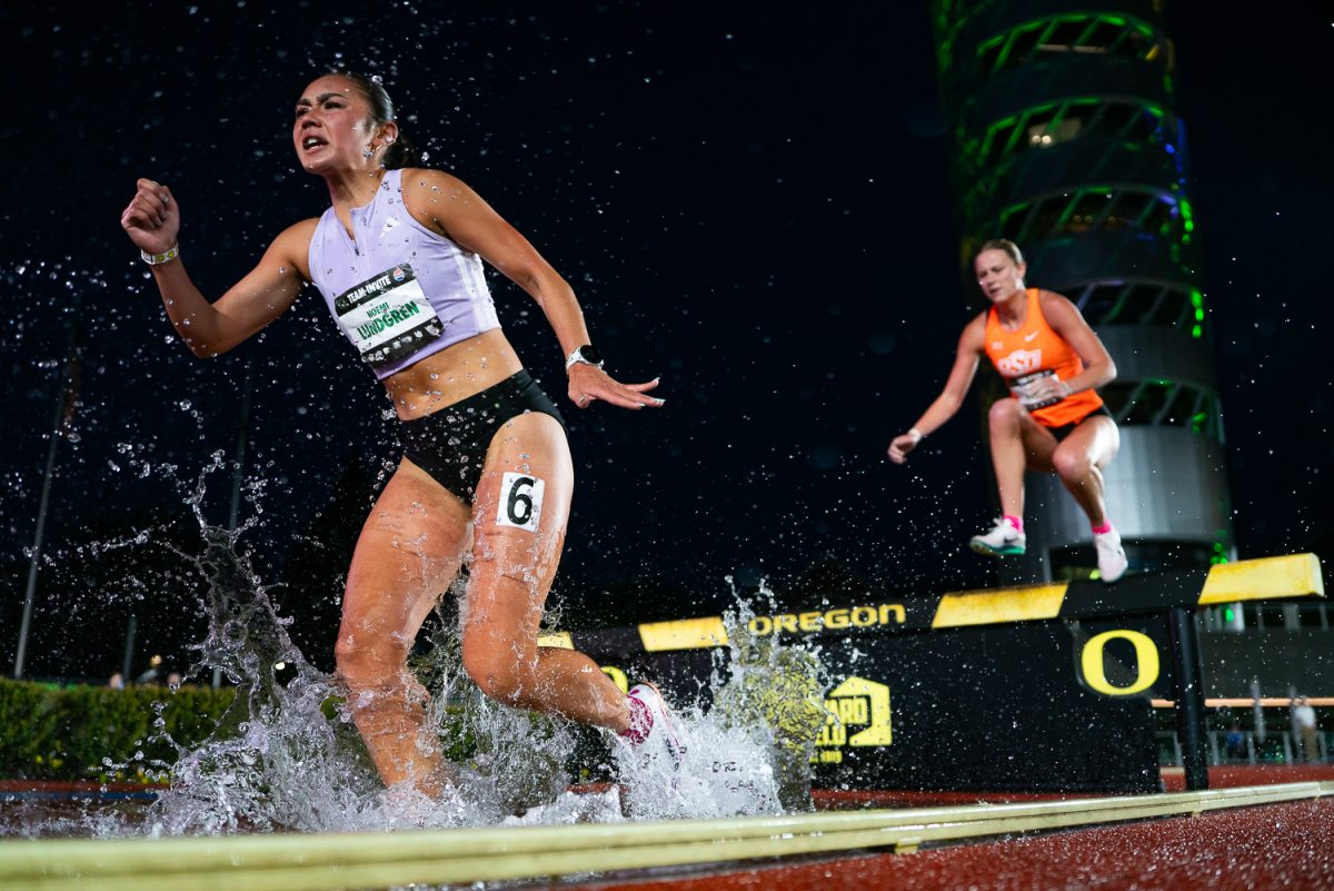 Unattached distance runner Noemi Lundgren hurdles the water barrier during the women's 3000m steeplechase.The University of Oregon Ducks host the second day of the Oregon Team Invitational, on April 18, 2026, at Hayward Field in Eugene, Ore. (Saj Sundaram/Emerald)
