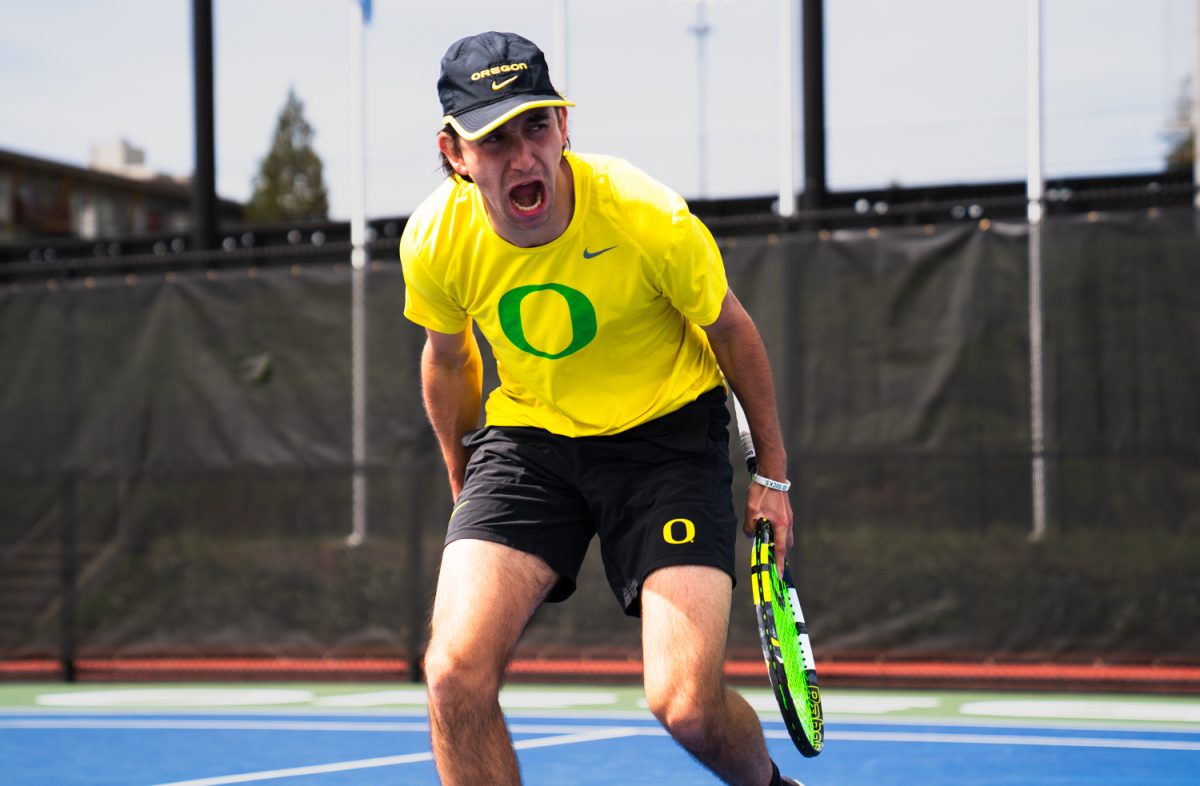 Duck senior Lachlan Robertson celebrates scoring against his opponent in a tight match. On April 19, 2026 the University of Oregon men's tennis team took on the University of Southern California trojans at a home game in Eugene, Ore. (Katie Poluyansky/Emerald)