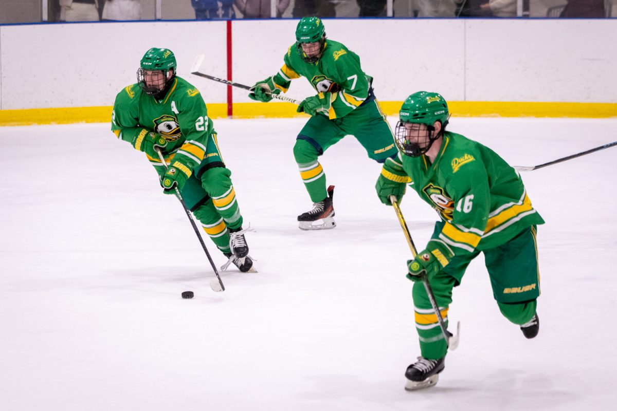 Ducks forward Jackson Henningsgard (22), forward Toby Kerr (16) and Griffin Browne (7) go on the attack in the third period. UO Club Hockey hosted its 2026 Spring Game on April 17, 2026 at the Rink Exchange in Eugene, Ore. (Corey Hoffman/Emerald)