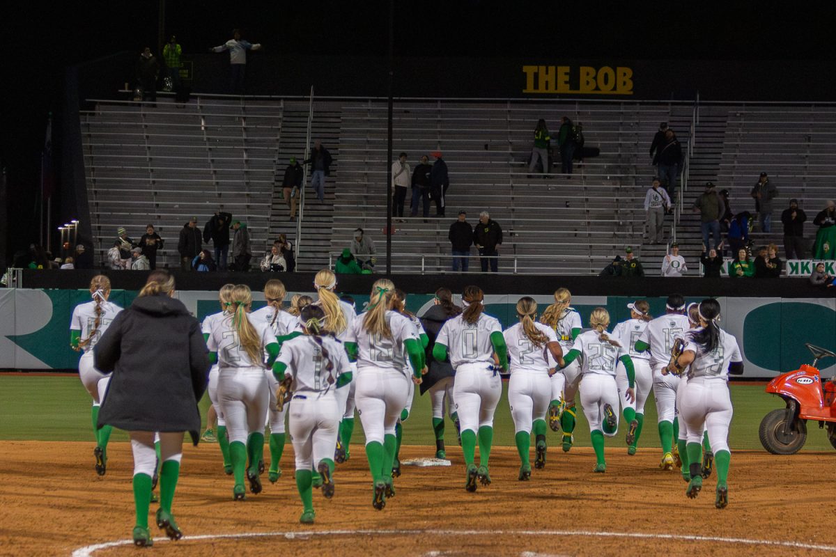 The Oregon Softball team runs out to the GA seating to thank their fans. On April 17, 2026, The Oregon Ducks beat The Washington Huskies [8-4] at Jane Sanders Stadium, at University of Oregon, based in Eugene, Ore. (Fred Hall/Emerald)