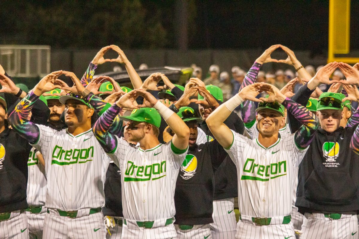 The Oregon Baseball team throws up their “O”s to the fans after winning. On April 24, 2026, The Oregon Ducks defeated the Penn State Nittany Lions [5-4], at PK Park, at University of Oregon, Based in Eugene, Ore. (Fred Hall/Emerald)
