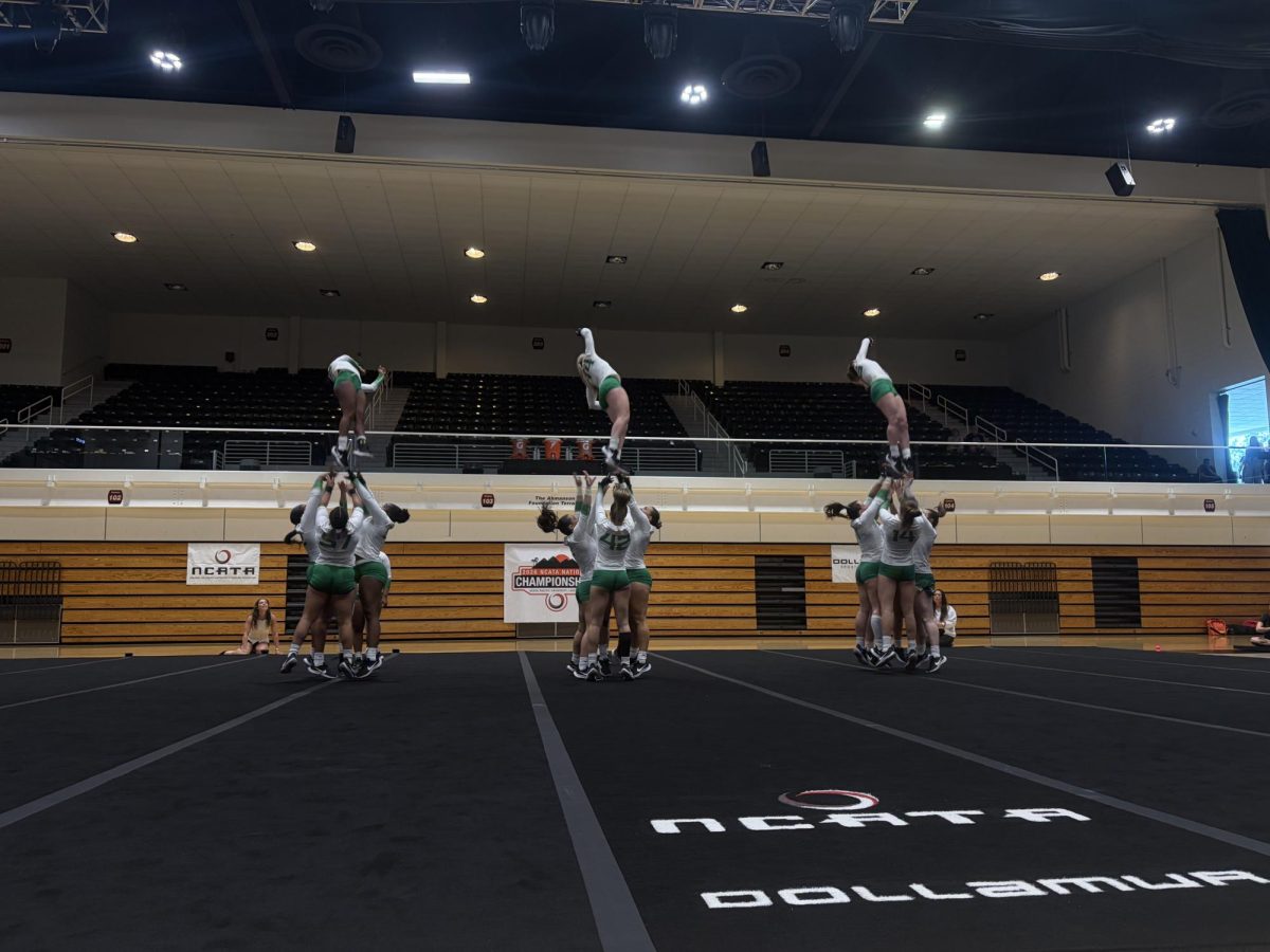 No. 2 Oregon acrobatics and tumbling competes the toss portion of its team event against No. 7 Gannon University at Felix Events Center in Azusa, Calif. on April 23, 2026. The Ducks won their quarterfinal matchup over the 
