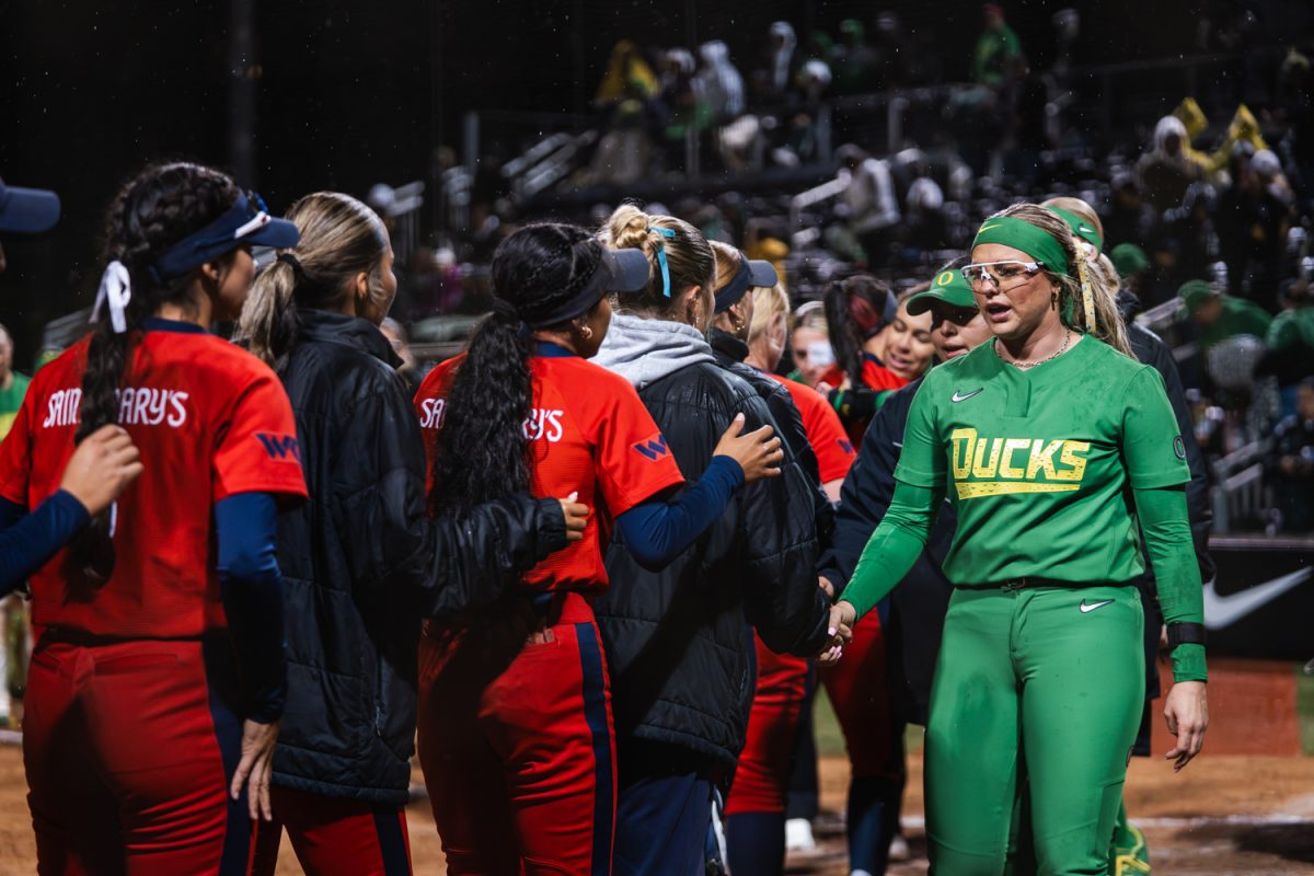 Both teams shake hands at the endgame ceremony. After a long season, the Oregon Ducks fell to Saint Mary’s 5-4 on May 16, 2026, at the 2026 NCAA Regional at Jane Sanders Stadium in Eugene, Ore. (Lilly Wall/Emerald)
