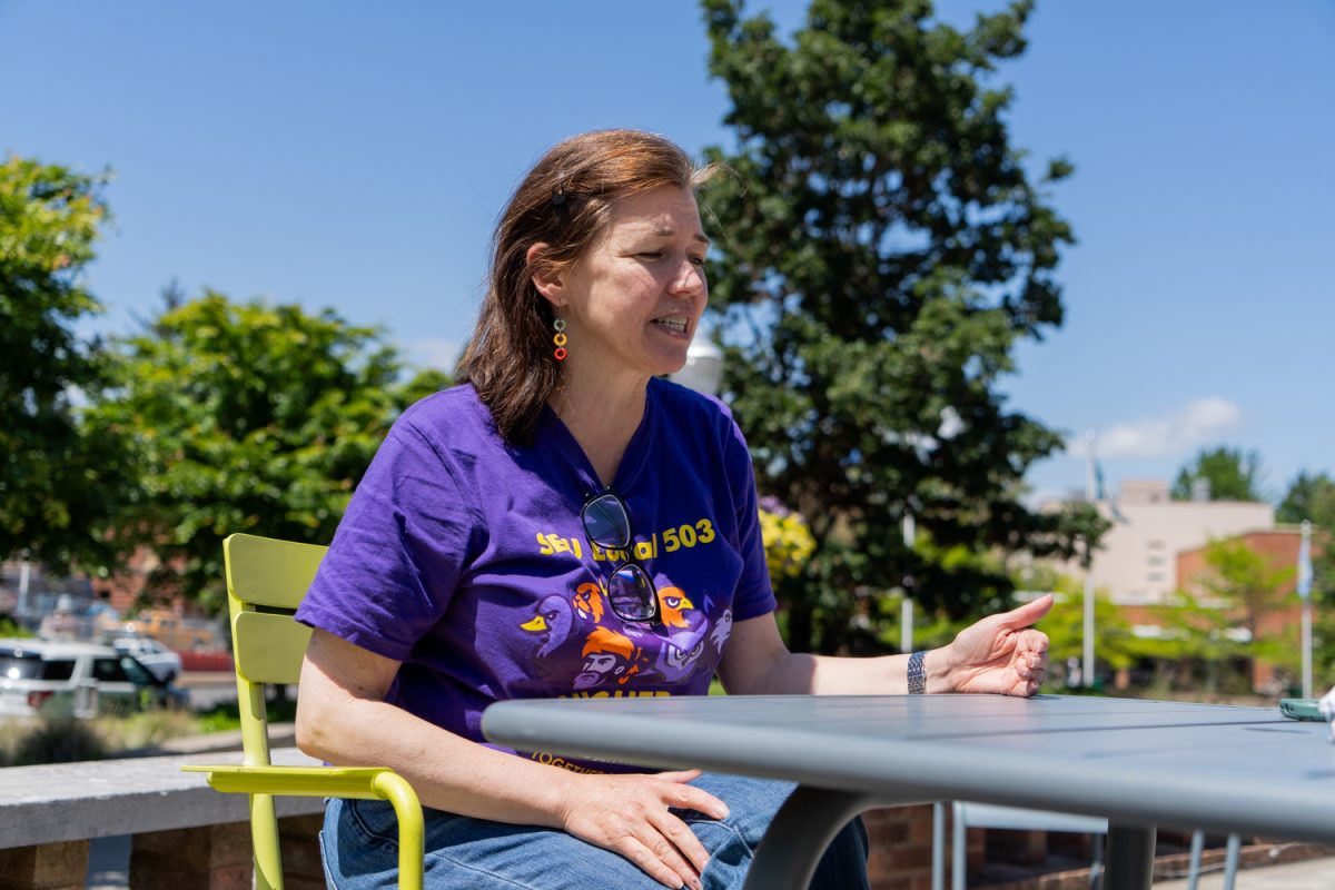 Jennifer Smith, Union Leader and Community Organizer for Eugene City Council Ward 3, sits by the EMU ampetheater as she discusses her term plans with Daily Emerald writer Billie Corsetti in Eugene, Ore., on May. 27, 2026. (Rowan Campbell/Emerald).