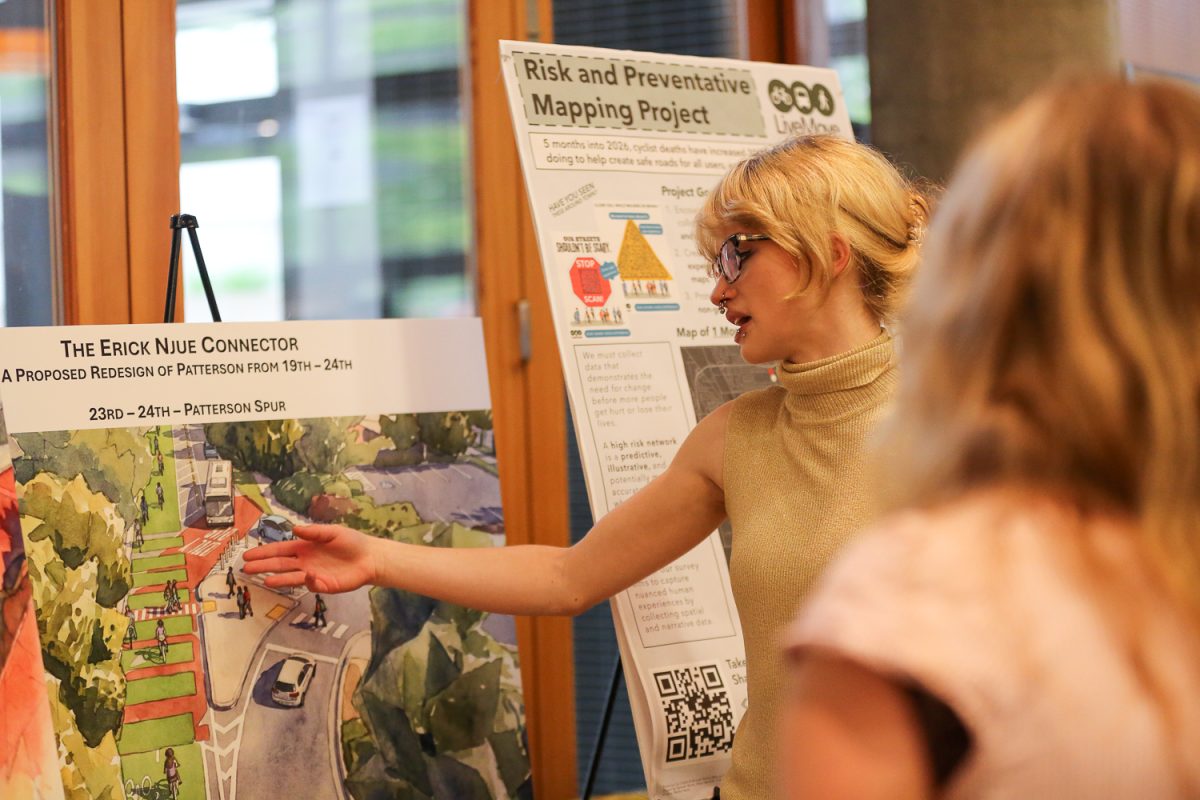LiveMove secretary, Hannah Norris, presents research on transportation risk reduction. The PPPM Awards took place in Eugene, Ore. on May 28, 2026 in the Ford Alumni Center. (Heidi Thalman/Emerald)