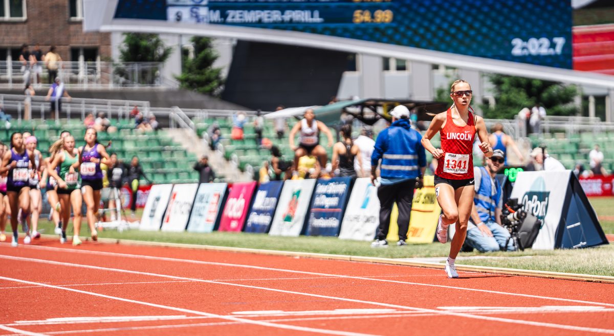 University of Oregon Track and Field commit and 6A girls 1500-meter state champion Ellery Lincoln lengthens her lead during the third lap. On May 30, 2026, hundreds of athletes traveled to participate in day three of the Oregon School Activities Association high school track and field state championships at Hayward Field in Eugene, Ore. (Lilly Wall/Emerald)