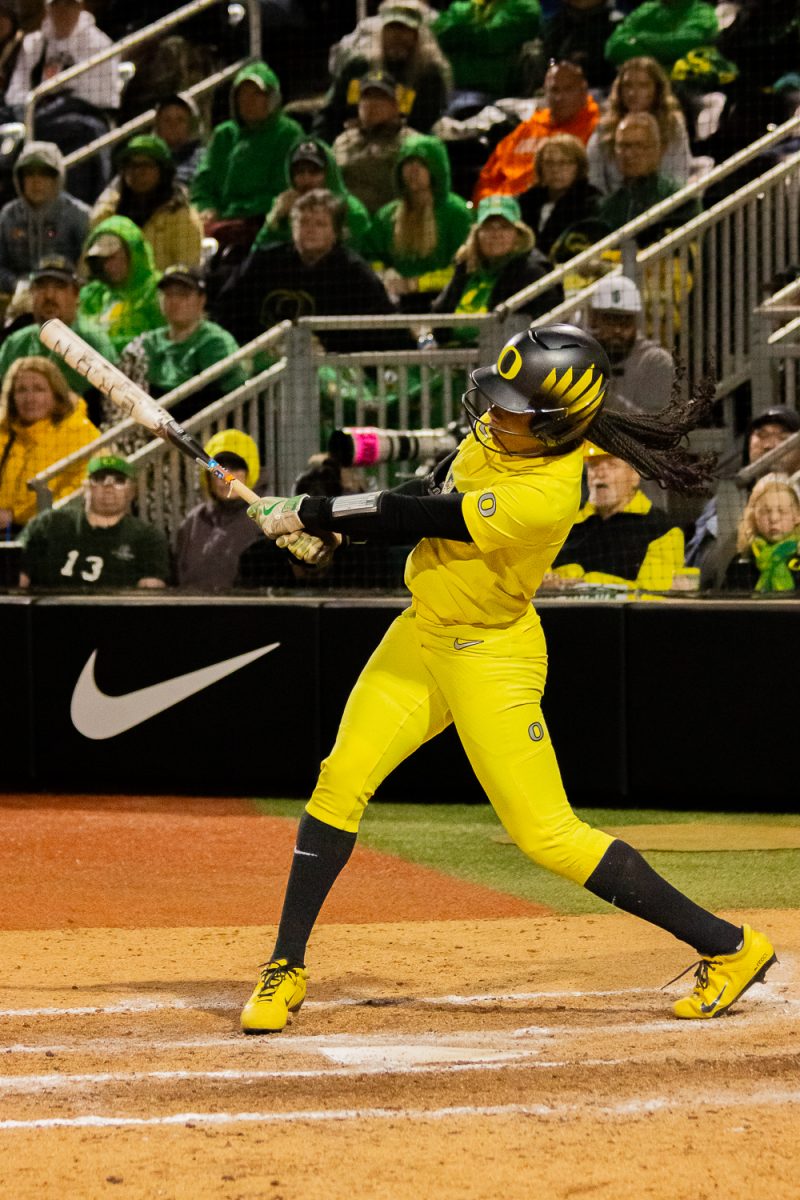 Oregon outfielder Ayanna Shaw (11) hits a grand slam to put the Ducks up over the Bengals [4-1]. On May 15, 2026, The Oregon Ducks defeated the Idaho State Bengals [5-1] in the first game of the NCAA D1 Softball Regionals, at Jane Sanders Stadium, at University of Oregon, based in Eugene, Ore. (Fred Hall/Emerald)