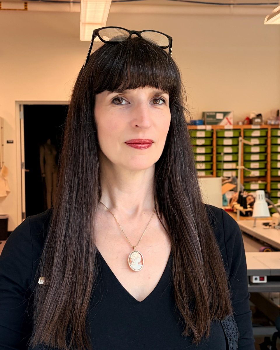 University of Oregon Costume Shop Manager Heather Bair said cameos, like the one she is wearing here, are an example of how fashion connects people to the past and engages their imaginations.