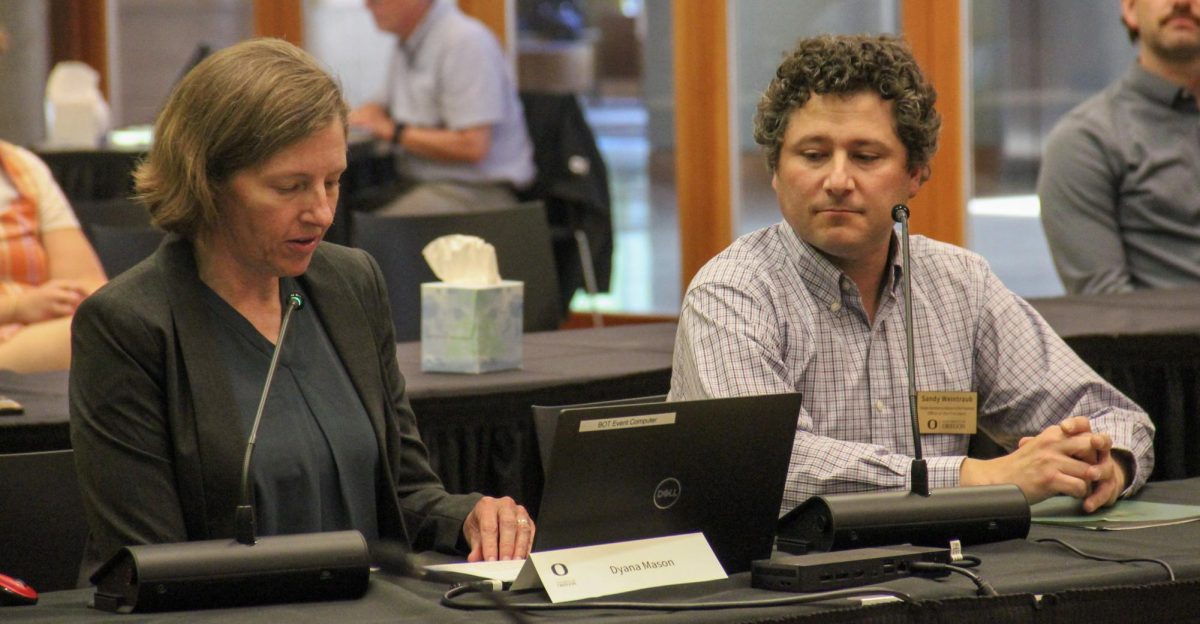 Faculty Senate Secretary and Advisor to the President Sandy Weintraub and outgoing Faculty Senate President and Associate Professor Dyana Mason provide updates to the Board of Trustees during a meeting at the Ford Alumni Center on June 1, 2026, in Eugene, Ore. Trustees discussed the university's ongoing budget reductions and their impact on campus operations. (Tarek Anthony/Emerald)